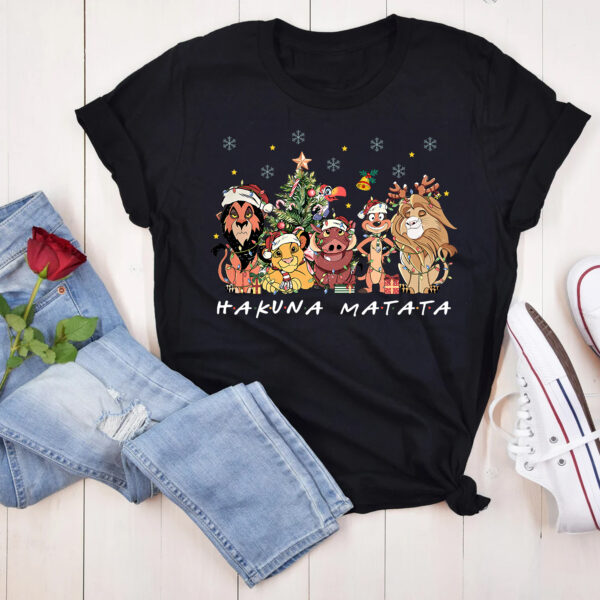 Hakuna Matata Lion King Christmas T-shirt featuring Mufasa, Simba, Timon, and Pumbaa, perfect for Disney holiday celebrations