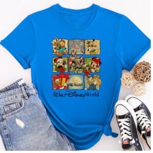 Blue Retro Walt Disney World Christmas Shirt with Disney characters in festive holiday scenes, perfect for Disney family gatherings