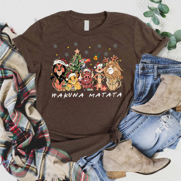 Cozy Lion King Christmas hoodie with Hakuna Matata design and festive characters, perfect for cold holiday evenings