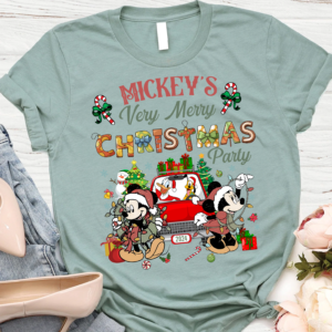 Disney fan wearing a Vintage Mickey's Christmas Party 2024 shirt at Walt Disney World during the holidays.