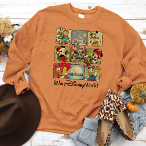 Blue Retro Walt Disney World Christmas Shirt with Disney characters in festive holiday scenes, perfect for Disney family gatherings