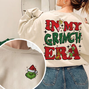 Playful In My Grinch Era shirt with playful Christmas design, featuring back and pocket prints.