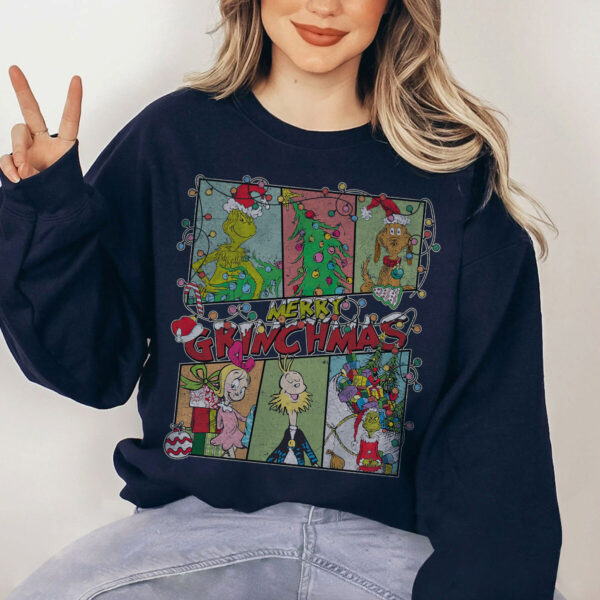 Person wearing a vintage Grinch Christmas crewneck at a holiday party, spreading festive cheer.