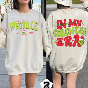 Person wearing a retro Whoville University crewneck sweatshirt, ideal for Christmas gatherings and winter outings.