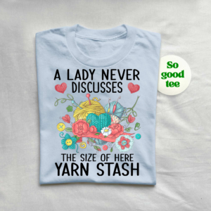 Knitting and crochet shirt featuring vibrant flowers, buttons, and yarn graphic